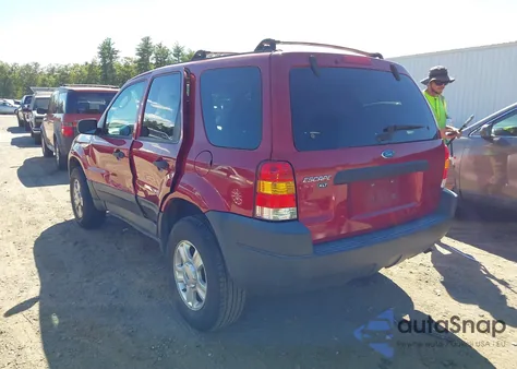 2003 Ford Escape Xlt z USA, uszkodzony, nr VIN 1FMYU93143KC64942
